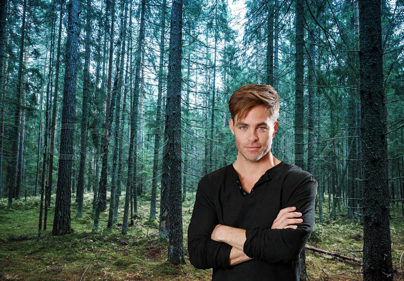 chris pine in a pine forest